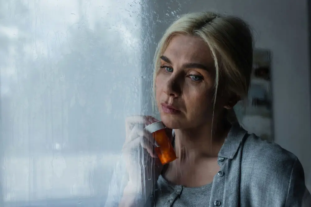 woman struggling with misuse of prescription medication