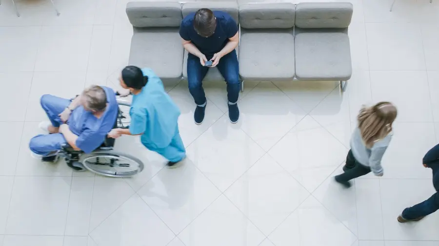 Hospital waiting room representing medical trauma triggers experienced by cancer patients.