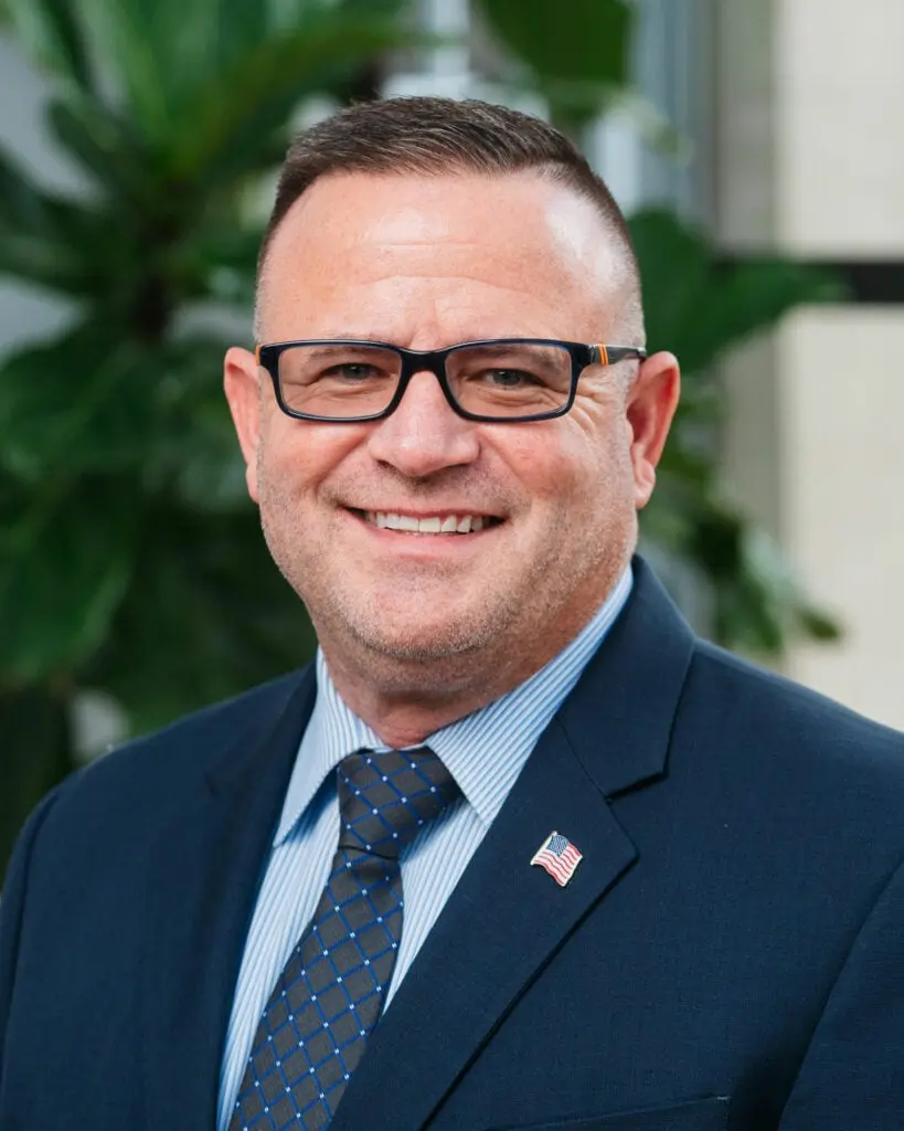 JohnBeckerHeadShot-819x1024