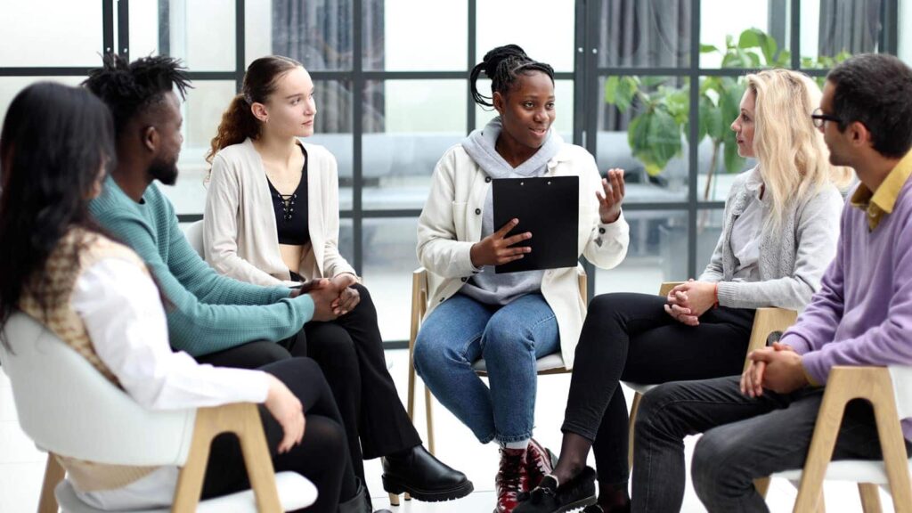 Therapist explaining the Intensive Outpatient Program to a patient