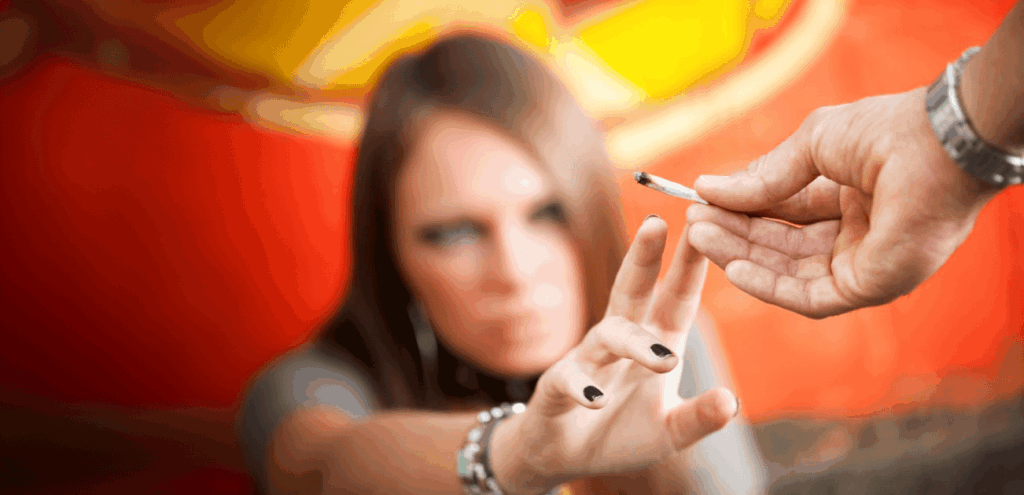 Teen girl about to smoke marijuana